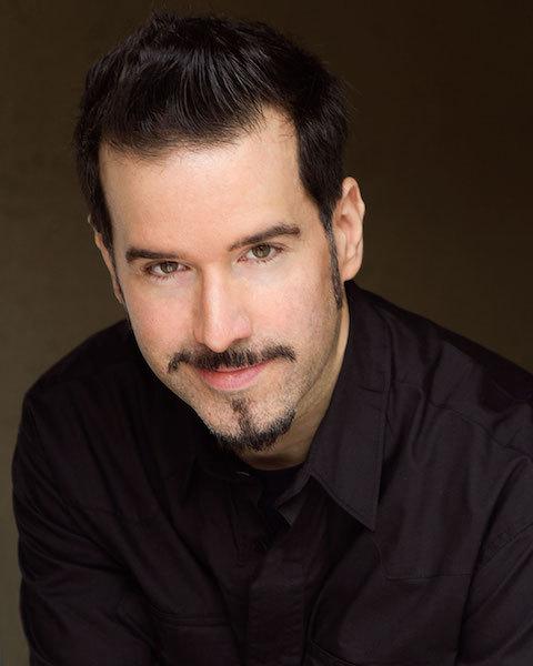 Aaron M Bass